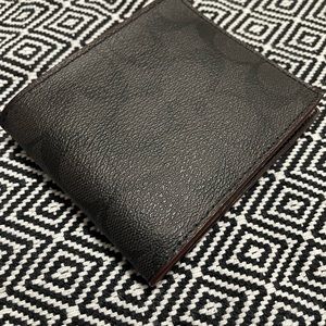 Men’s COACH signature canvas wallet